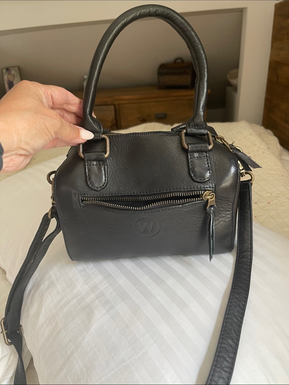 Black Leather Satchel with Top Handles and Crossbody Strap